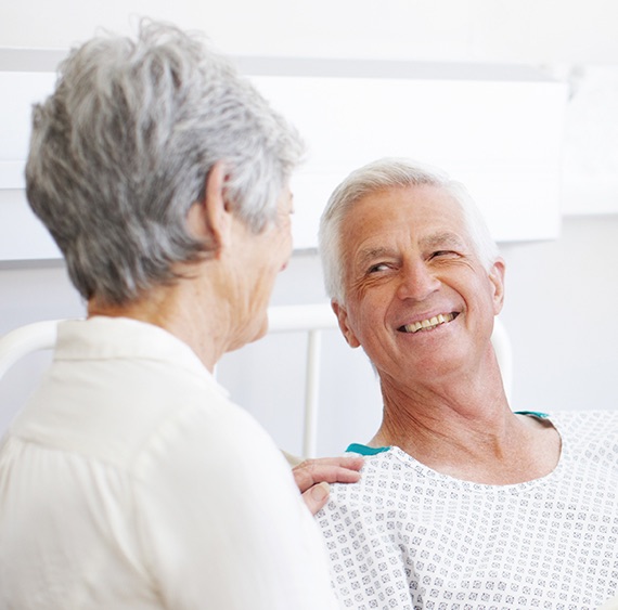 Old couple smiling