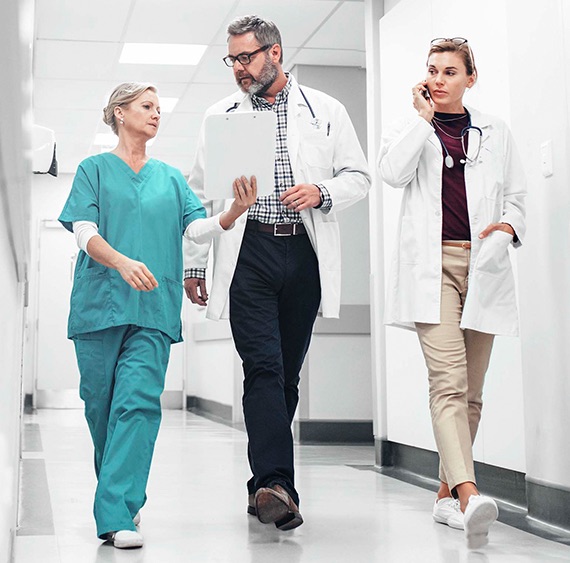 Doctors walking in Hospital 