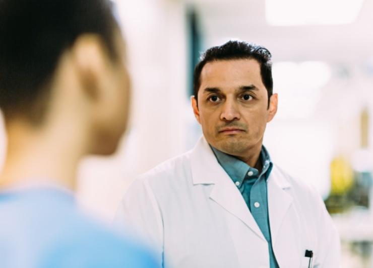 Doctor talking with nurse