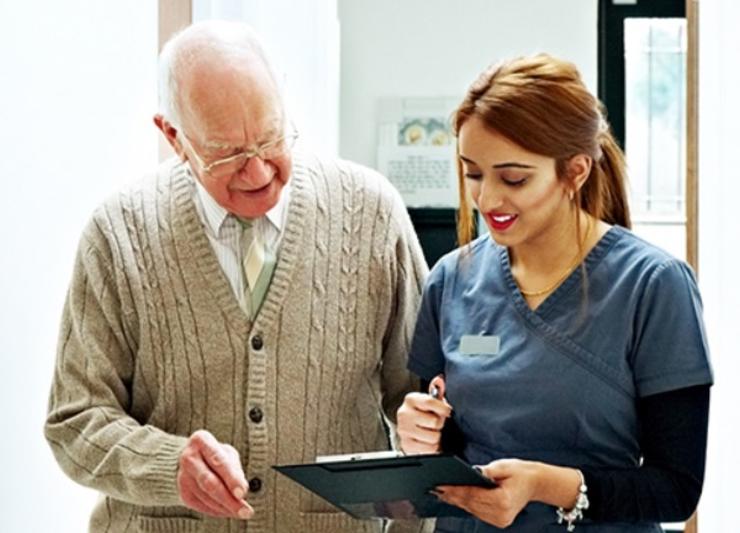 Nurse talking to patient