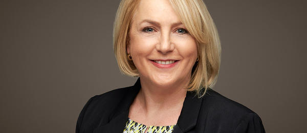 White female wearing business attire